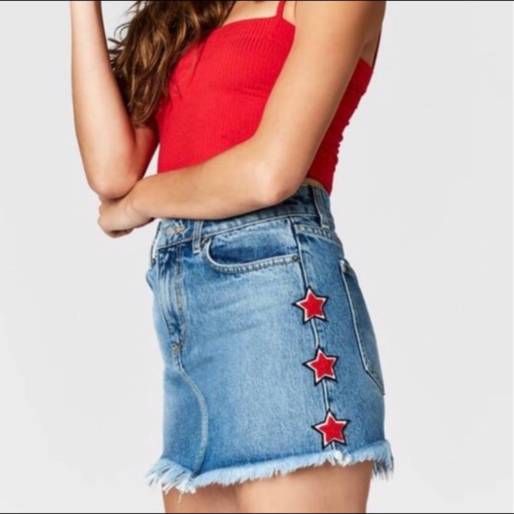 Carmar, blue denim skirt with red stars on side